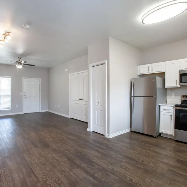 Willow 2x2 apartment homes featuring open-concept living spaces, modern kitchens, spacious bedrooms, and covered parking in a professionally maintained community