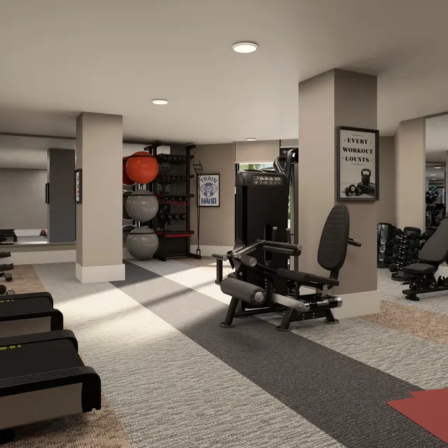 A spacious modern gym Interior featuring various fitness equipment, including treadmills, weight machines, and exercise mats. The design is bright with natural lighting from large windows.