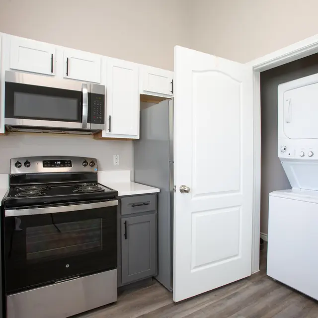 Willow 2x2 apartment homes featuring open-concept living spaces, modern kitchens, spacious bedrooms, and covered parking in a professionally maintained community