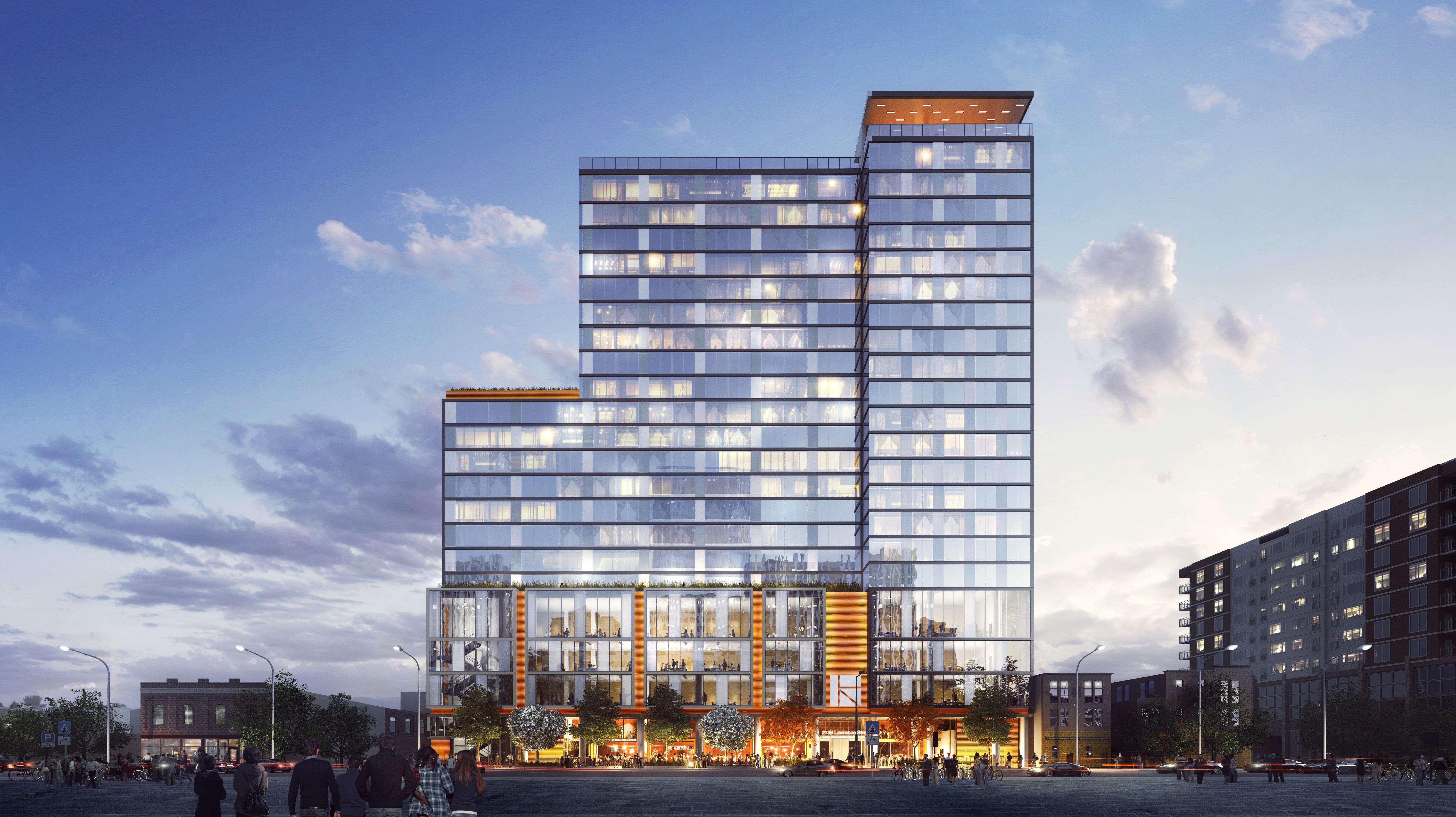 Modern Multi-Story Office Building A modern multi-story office building with a sleek glass facade, featuring a mix of commercial spaces at the ground level and residential spaces above. The building is set against a twilight sky with scattered clouds and is surrounded by a plaza with people walking around.