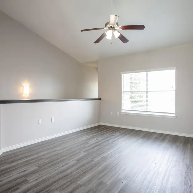 Willow 2x2 apartment homes featuring open-concept living spaces, modern kitchens, spacious bedrooms, and covered parking in a professionally maintained community