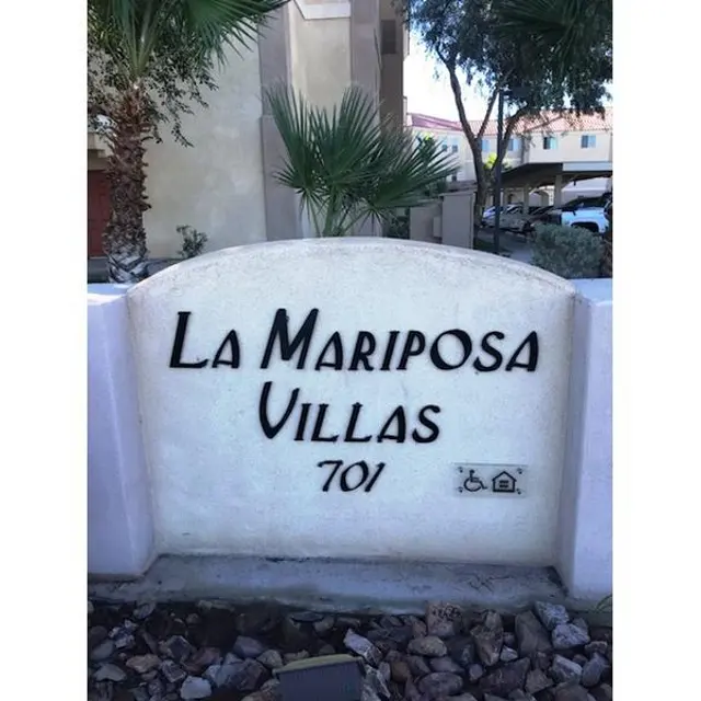 La Mariposa Villas Sign Sign for La Mariposa Villas, displaying the name and unit number 701.