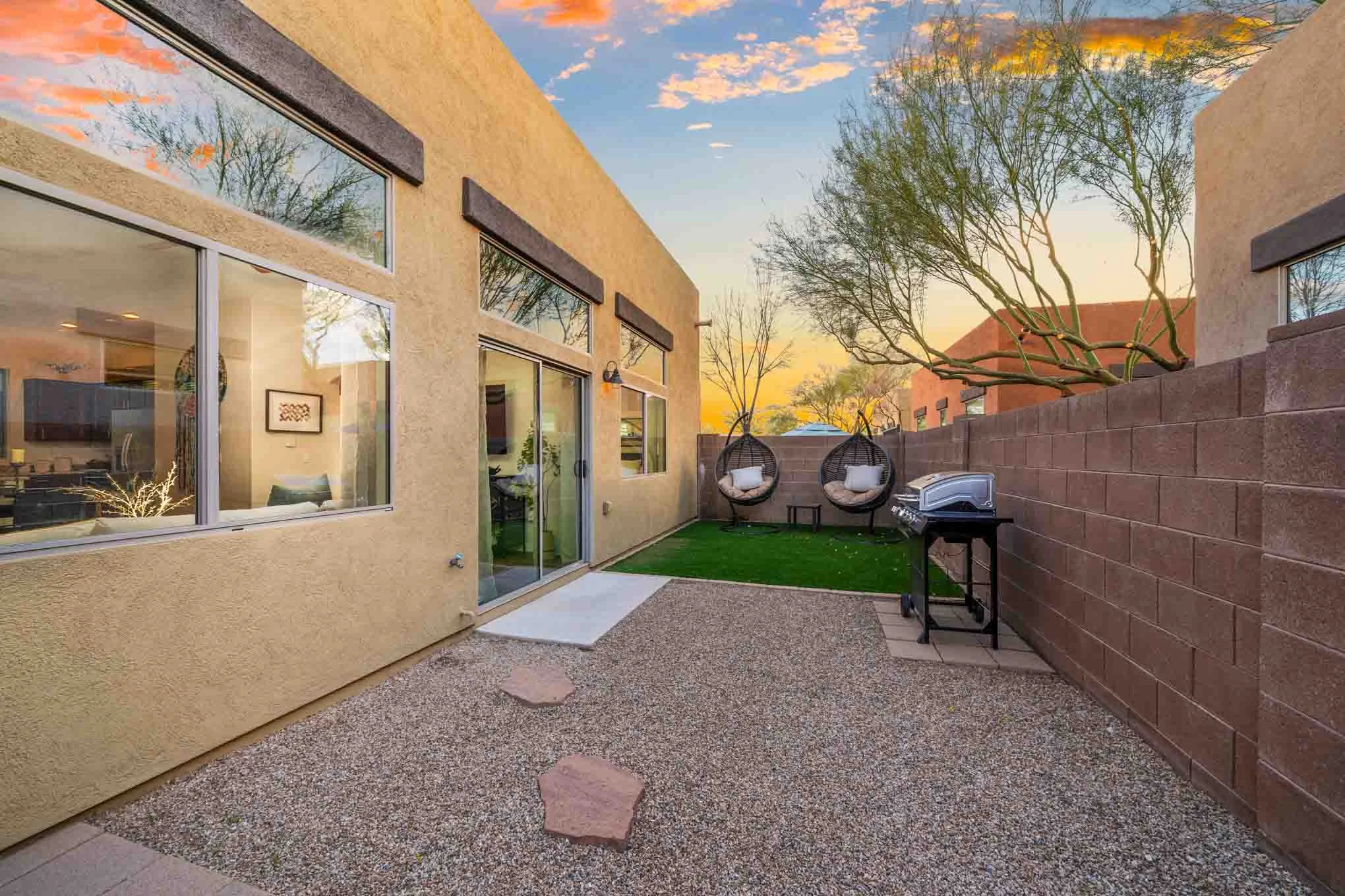 Avilla Marana Private backyard with outdoor grilling area at Avilla Marana detached rental homes