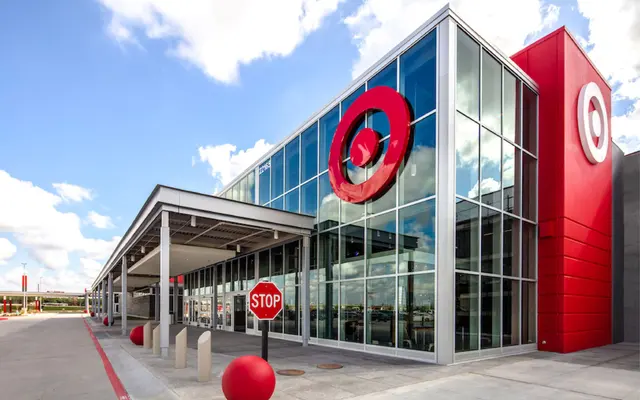 Exterior view of a Target store featuring large glass windows and the iconic red Target logo.