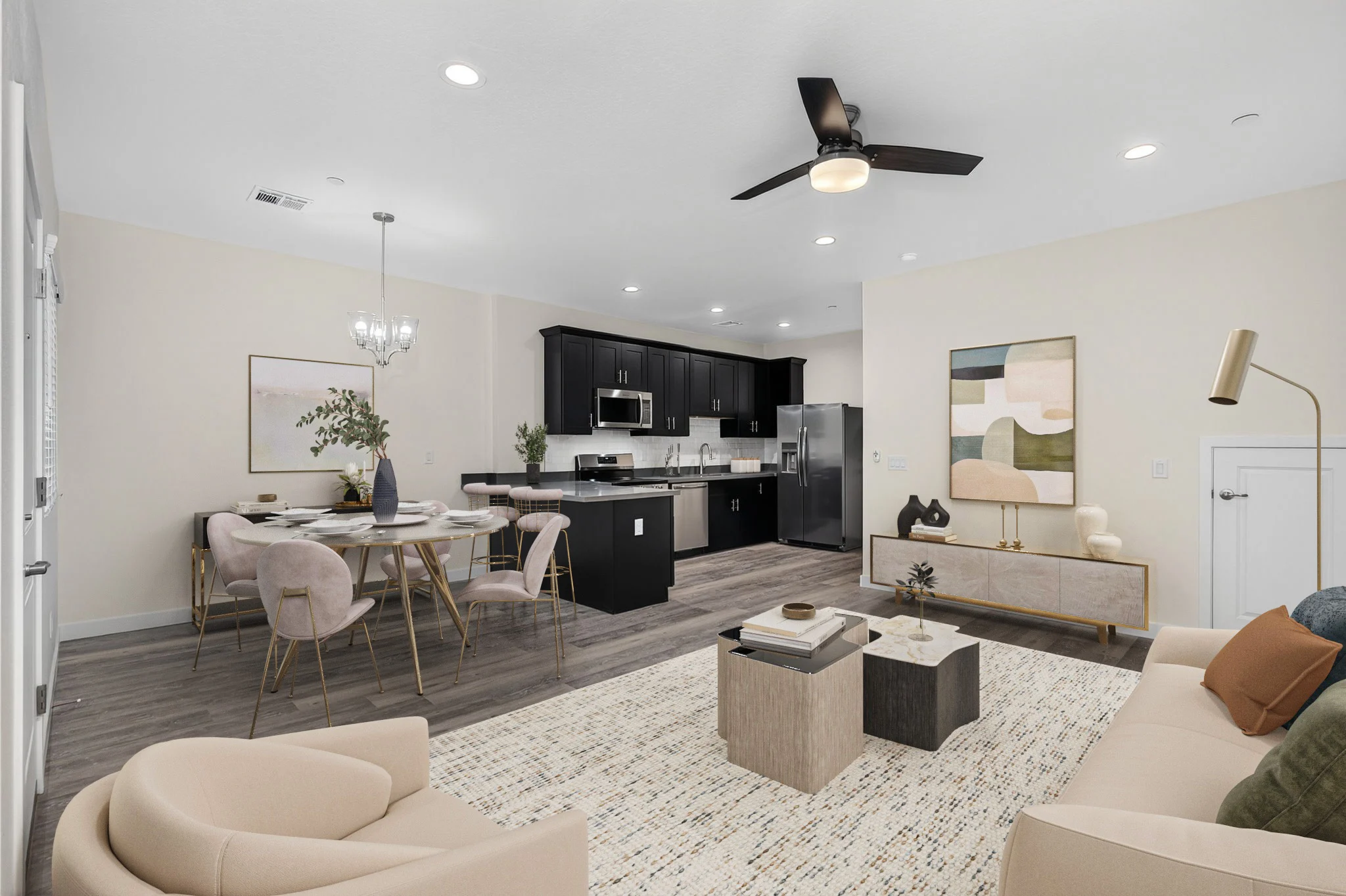 Contemporary Living Room and Kitchen Design A modern and spacious living room with an open kitchen layout, featuring a light-colored sofa and stylish furniture.