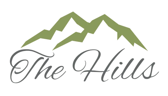 The Hills - Logo featuring stylized mountains and the text 'The Hills' in script font.