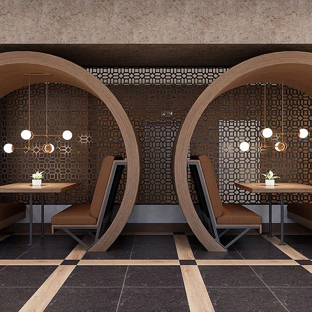Two round booths in a modern restaurant, featuring wooden structures, soft seating, and decorative lighting.