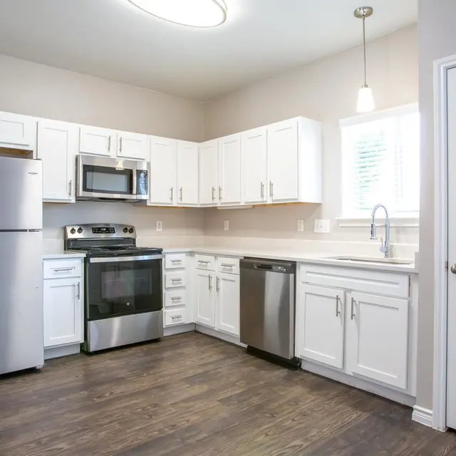 Willow 2x2 apartment homes featuring open-concept living spaces, modern kitchens, spacious bedrooms, and covered parking in a professionally maintained community